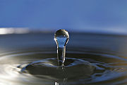 ملف:Water droplet blue bg05.jpg